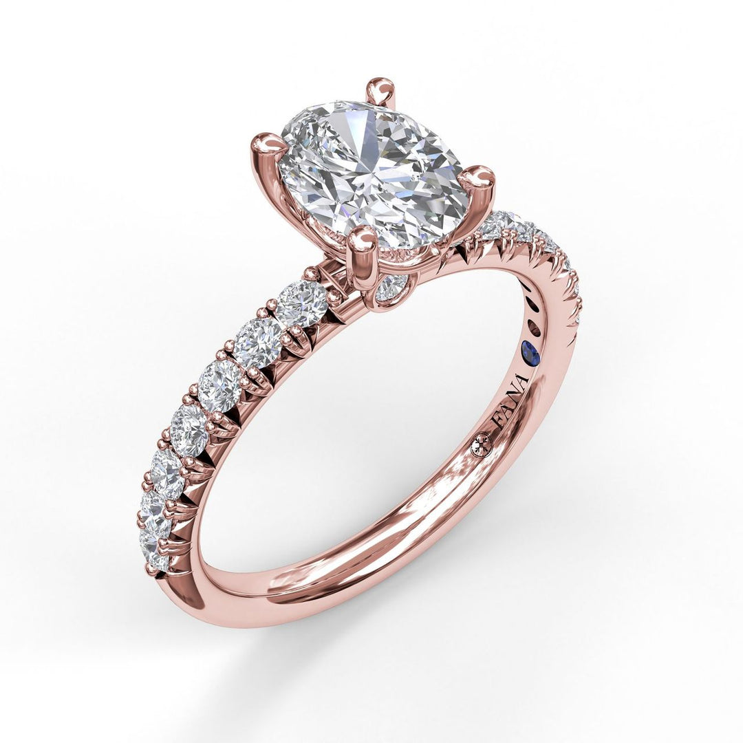 Oval Cut Solitaire With French Cut Pave