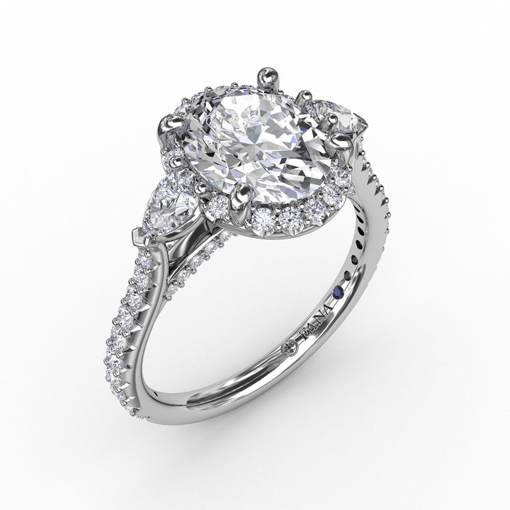 Oval Diamond Halo Engagement Ring With Pear-Shape Diamond Side Stones