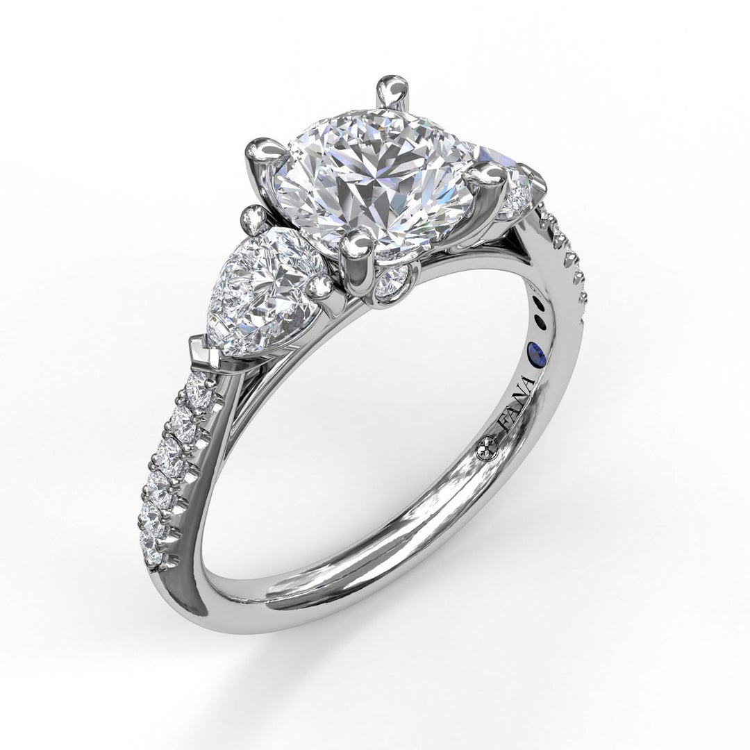 Three-Stone Engagement Ring With Pear Cut Side Stones