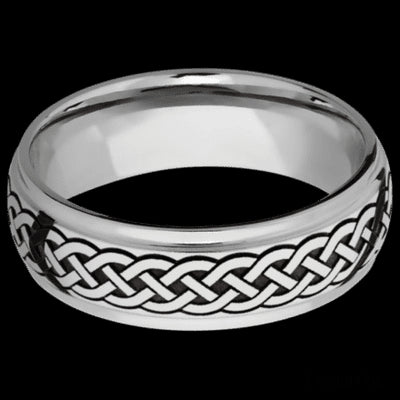 7 mm wide/Domed Stepped Down Edges/Cobalt Chrome band with a laser carved Celtic 9 pattern.