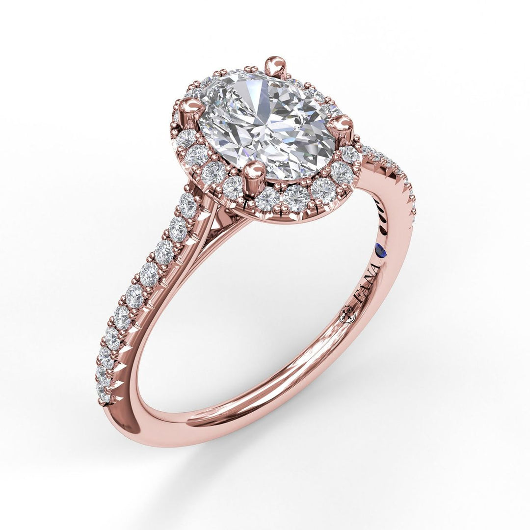 Delicate Oval Shaped Halo And Pave Band Engagement Ring