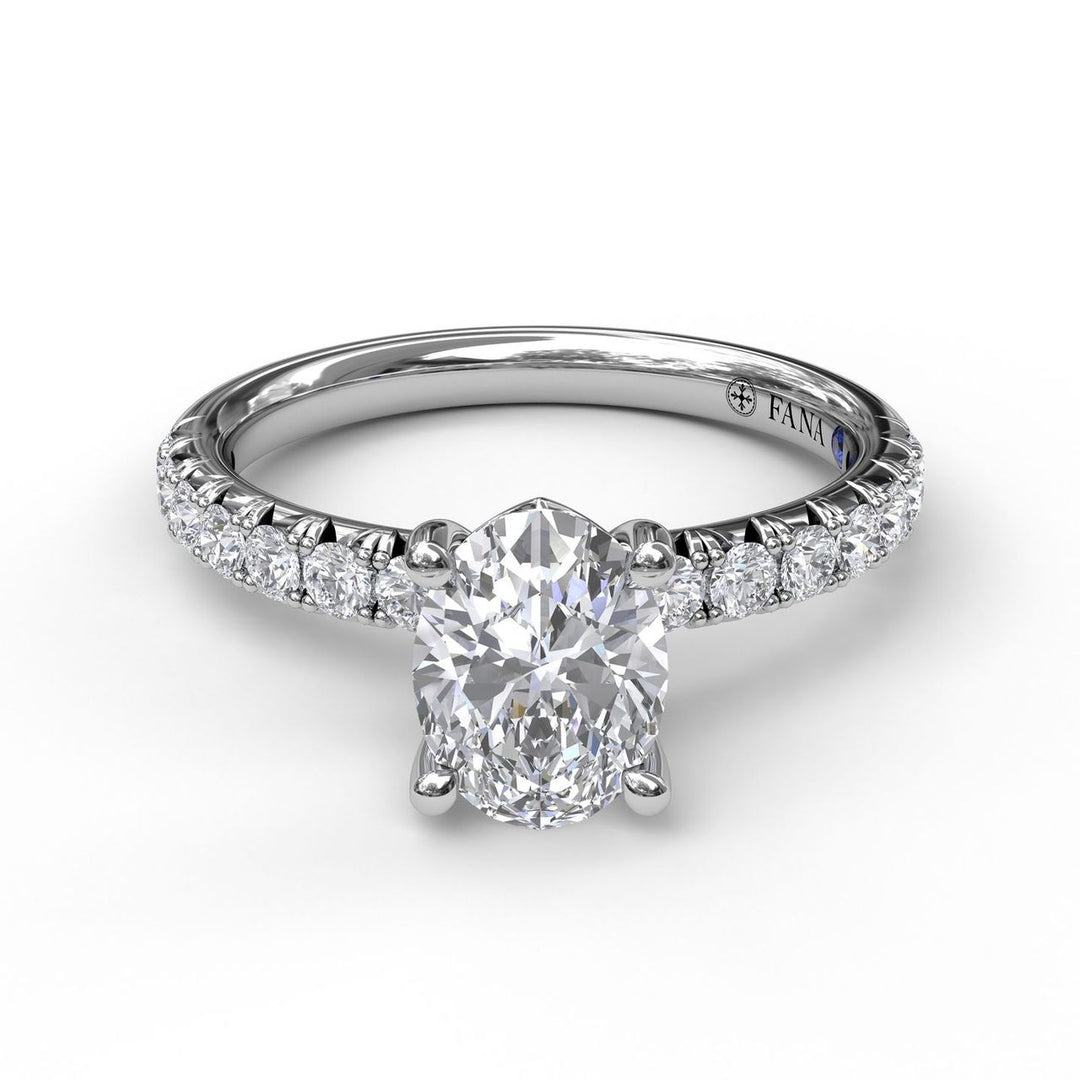 Oval Cut Solitaire With French Cut Pave