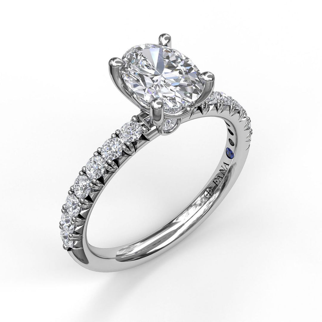 Oval Cut Solitaire With French Cut Pave