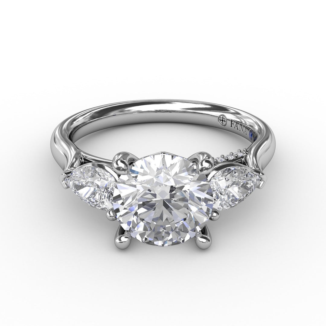 Classic Three-Stone Engagement Ring With Pear-Shape Side Diamonds