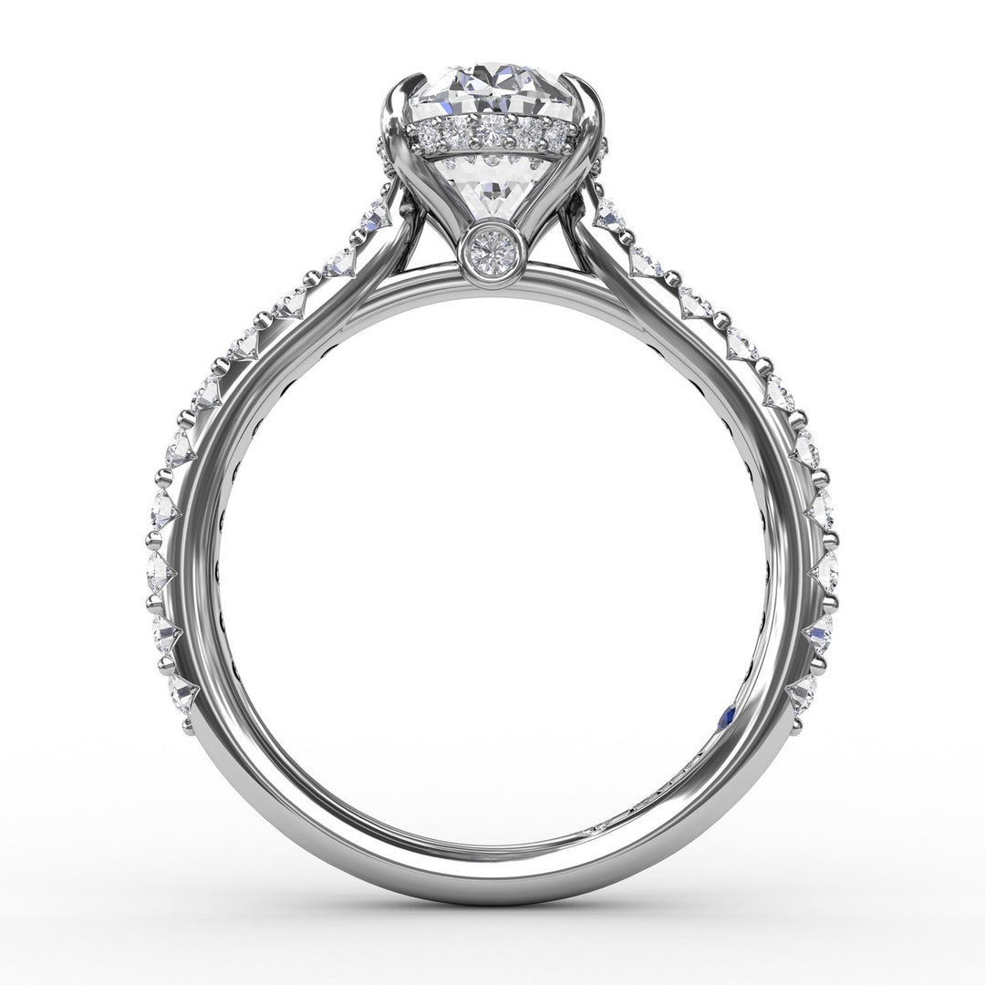 Classic Oval Diamond Solitaire Engagement Ring With Hidden Pavé Halo