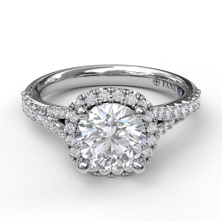 Classic Halo With A Twist Engagement Ring