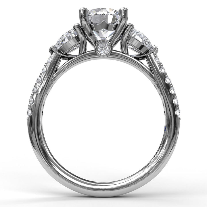 Three-Stone Engagement Ring With Pear Cut Side Stones