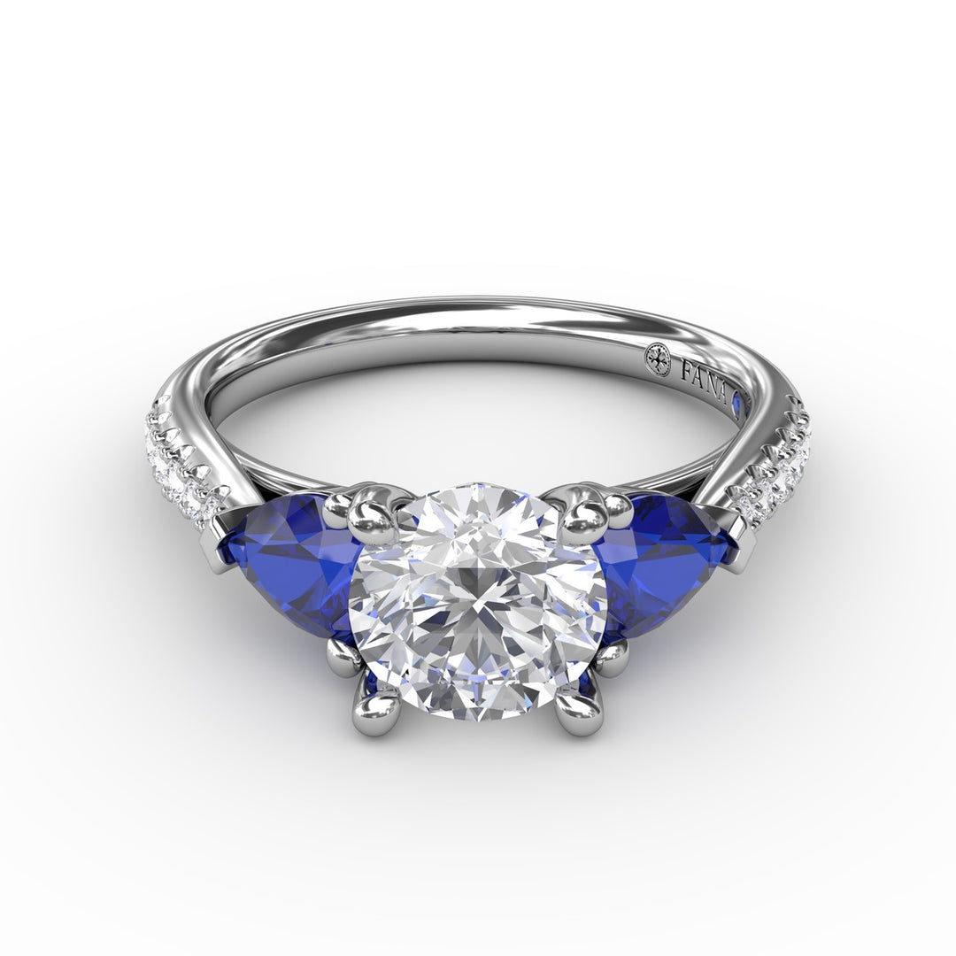 Elegant Pear Sidestone Ring in Sapphire