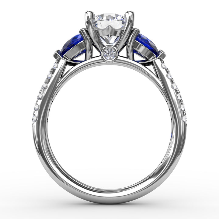 Elegant Pear Sidestone Ring in Sapphire